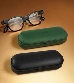 SGG VAULT Charge Black and Green Rokid charging cases beside Rokid Glasses — SmartGlass Gear