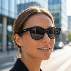 SGG Rokid SunClip lifestyle photo showing polarized clip-on sunglasses on Rokid Glasses outdoors — SmartGlass Gear