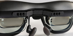 Close installed detail of SGG BREEZE with three rectangular openings at each end, six total; surrounding glasses, nose pads and insert frame shown for installation context.