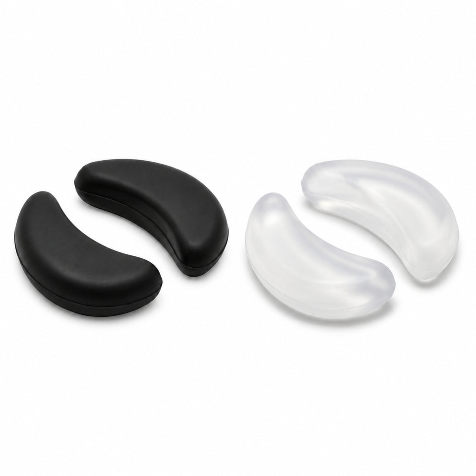 Two pairs of silicone replacement nose pads, Black and translucent White, four pieces.